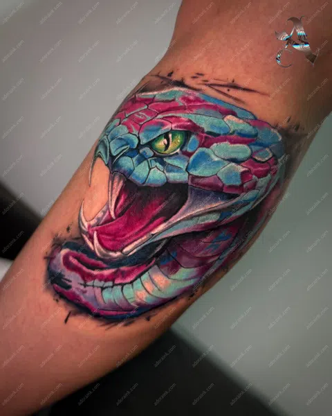New School tattoo of Vivid Blue & Pink New School Snake Tattoo, Vibrant new school tattoo, New school tattoo full sleeve